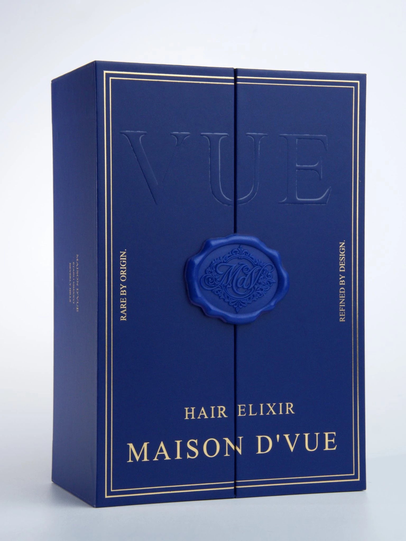 Unboxing MAISON D'VUE Hair Elixir in custom navy gift coffret with gold wax seal