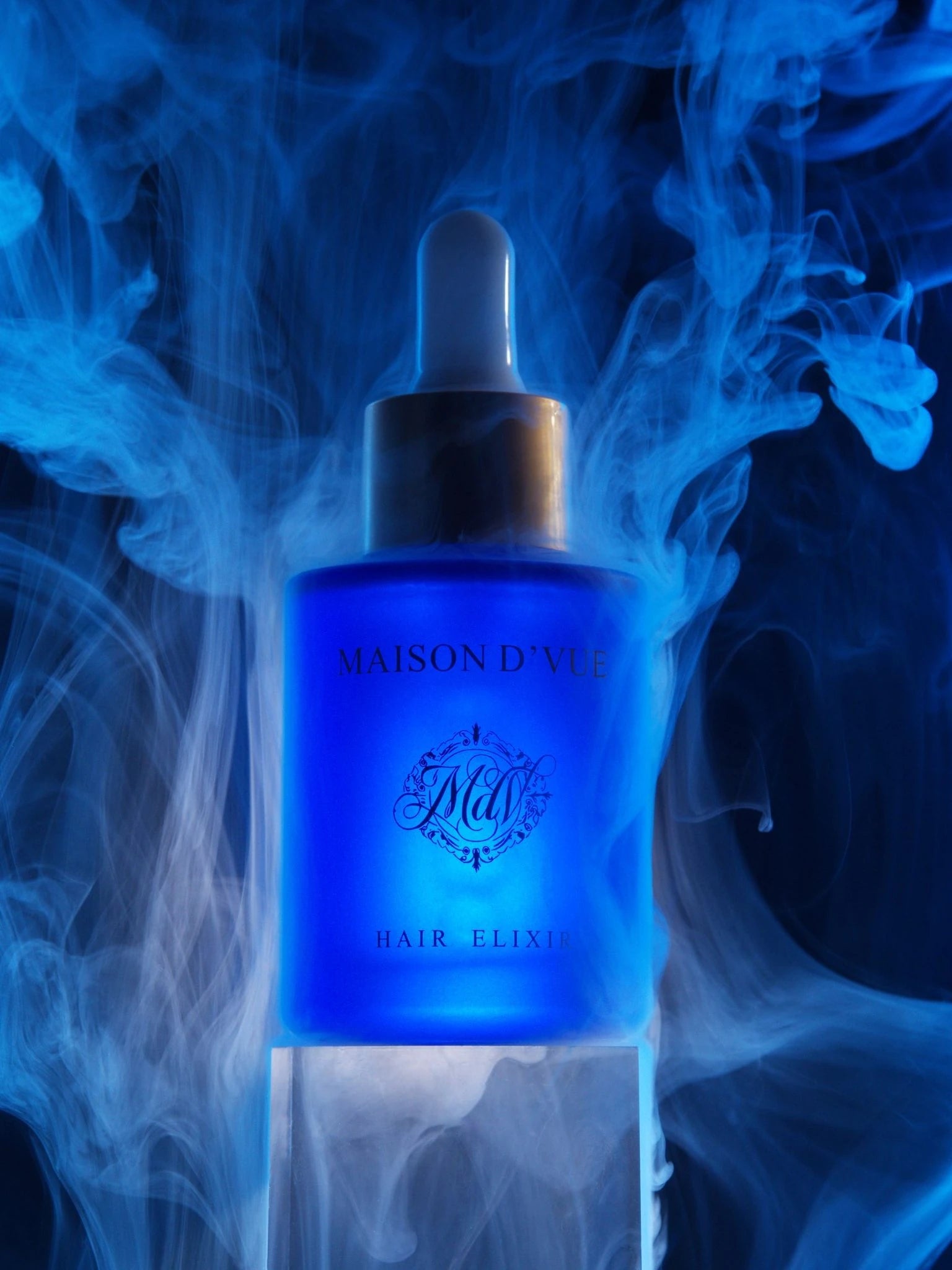 The Signature — 30ml MAISON D'VUE Hair Elixir in cobalt frosted glass with matte gold cap